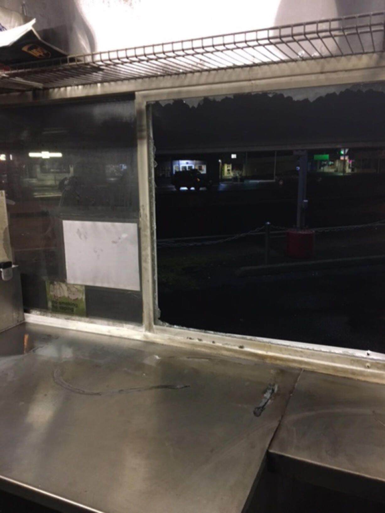 A window, punched out so firefighters could extinguish an 1 a.m. blaze, is among the repairs facing the owners of Pizzeria La Sorrentina.