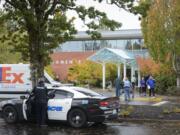 Police detained an armed fugitive at Kaiser Permanente's Salmon Creek Medical Office after using less-than lethal rounds on the suspect Friday.