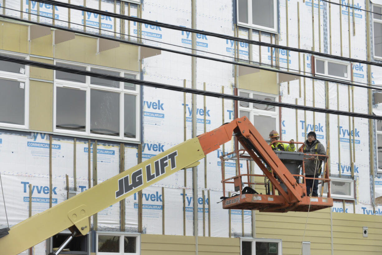 Construction continues in downtown Vancouver on 13 West apartments, a subsidized complex at 1314 Columbia St. that will provide 92 apartments for low- to moderate-income households.