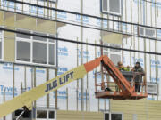 Construction continues in downtown Vancouver on 13 West apartments, a subsidized complex at 1314 Columbia St. that will provide 92 apartments for low- to moderate-income households.