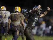 Hockinson's Wyatt Jones (31) celebrates after a Columbia River field goal attempt is no good in the third quarter at Hockinson High School on Friday night, Oct. 14, 2016.