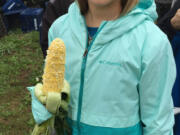 Hazel Dell: Ellsworth Elementary School&#039;s Olivia Hayes was one of about 80 fifth-graders to visit the 78th Street Heritage Farm for a Farm to Fork event, where she and her classmates learned where their food comes from.