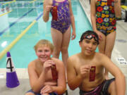 Green Meadows: At the Kids Club for Fun and Fitness Swim Meet, Green Meadows Swim Team members Jasmine Andrieu, back from left, and Berkeley McLean, Noah Schmidt, front from left, and Cody Mowery all earned medals.