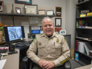 Sheriff Chuck Atkins, seen at his Vancouver office in December, caused concern among Clark County councilors when he outlined how proposed budget cuts would affect programs in his department.