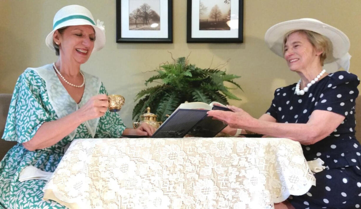 Chris Lines, left, and Nancy Stepsis portray members of the American Association of University Women of the 1930s and 1940s.