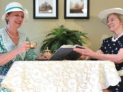 Chris Lines, left, and Nancy Stepsis portray members of the American Association of University Women of the 1930s and 1940s.