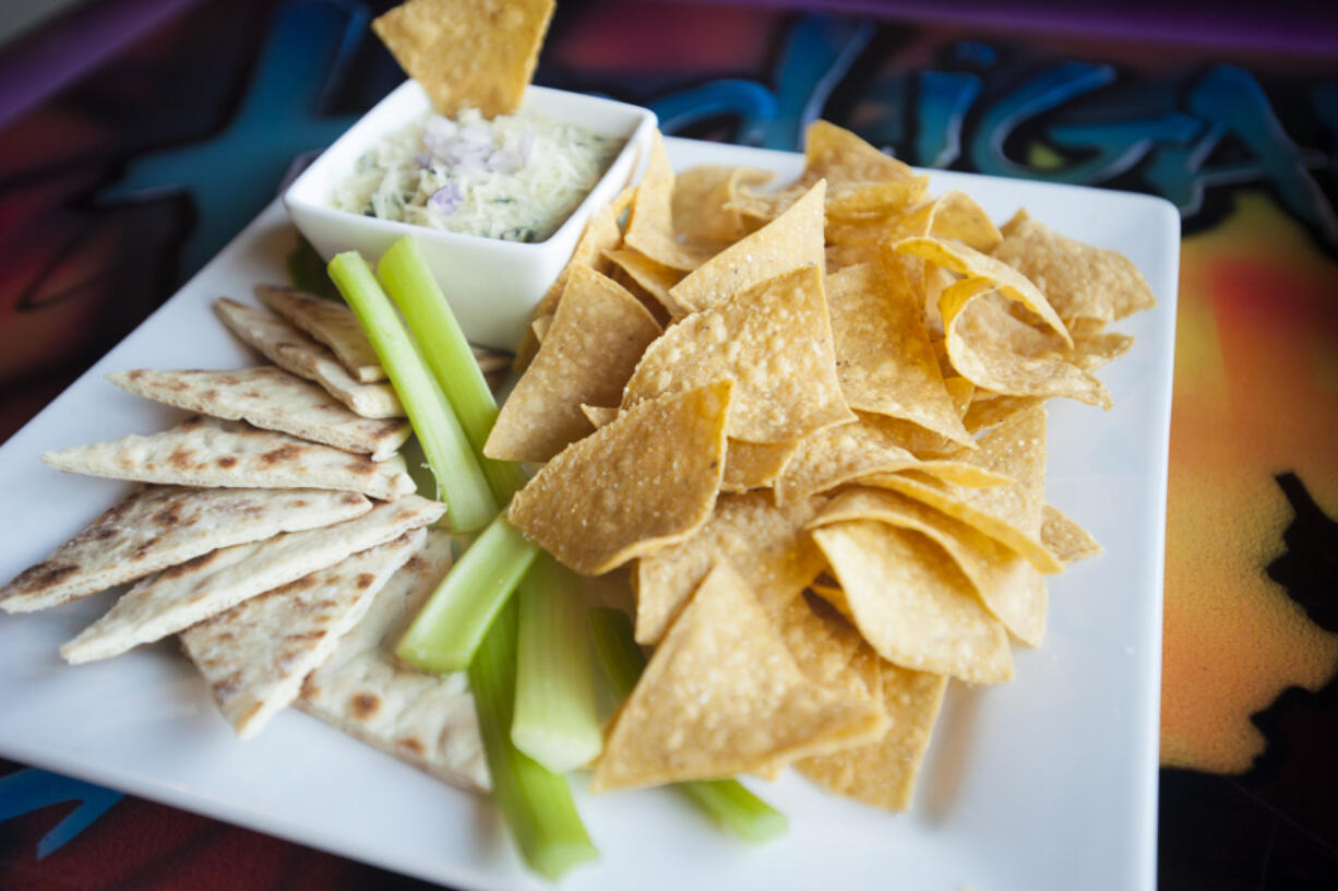 The spinach artichoke dip is served Sept. 30 at Hooligan&#039;s Sports Bar and Grill in Vancouver.