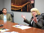 State Sen. Mark Miloscia, R-Federal Way, left, and Pierce County Auditor Pat McCarthy, a Democrat, talk Tuesday, Oct. 11, 2016, with The Columbian editorial board. The two are running for State Auditor.