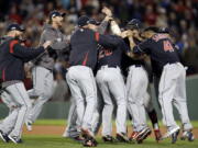 The Cleveland Indians celebrate their 4-3 win over the Boston Red Sox in Game 3 of baseball&#039;s American League Division Series, Monday, Oct. 10, 2016, in Boston.