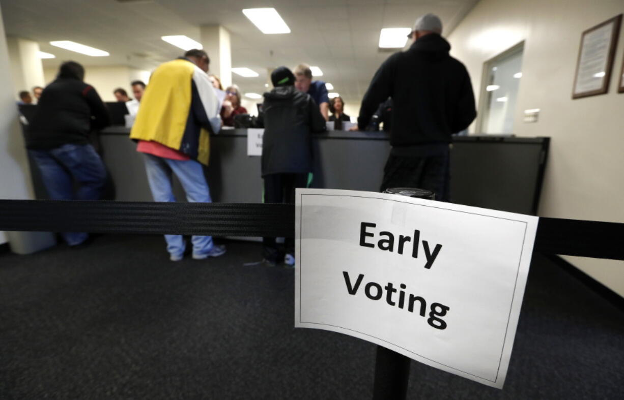 Local residents receive their ballots at the Polk County Election Office on the first day of early voting Sept. 29 in Des Moines, Iowa. Many Americans have at least some doubts about votes in this year&#039;s presidential election will be counted accurately, and a significant number are concerned about the possibility of interference in the election by foreign hackers.