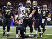 New Orleans Saints wide receiver Brandin Cooks (10), a former Oregon State standout, celebrates his touchdown reception in the second half of an NFL football game against the Seattle Seahawks in New Orleans, Sunday, Oct. 30, 2016.