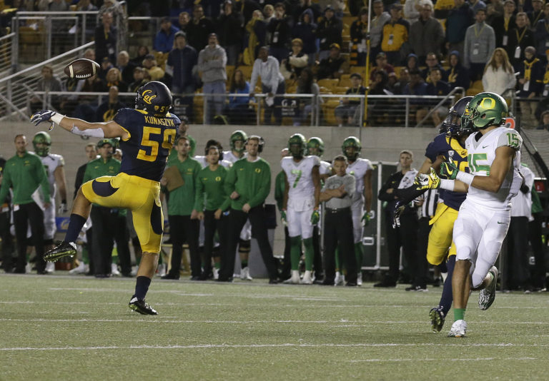 California linebacker Jordan Kunaszyk (59) intercepts a pass during the second overtime of an NCAA college football game against Oregon in Berkeley, Calif., Saturday, Oct. 22, 2016. California won 52-49.