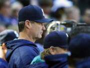 Seattle Mariners manager Scott Servais watches from the dugout during the eighth inning of a baseball game against the Oakland Athletics, Sunday, Oct. 2, 2016, in Seattle. (AP Photo/Ted S.