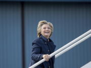 Democratic presidential candidate Hillary Clinton boards her campaign plane in White Plains, N.Y., on Tuesday to travel to Philadelphia. Clinton is scheduled to attend rallies in Haverford, Pa. and Harrisburg, Pa.