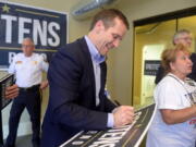 Missouri Republican gubernatorial candidate Eric Greitens meets with supporters Aug. 26 in downtown St. Joseph, Mo. Gubernatorial candidates in some states including Missouri have been staking strategic positions contrary to their party&#039;s national norms and presidential nominees. A former Navy SEAL officer, Greitens faces Democratic nominee, Attorney General Chris Koster in the general election. (Jessica Stewart/St.