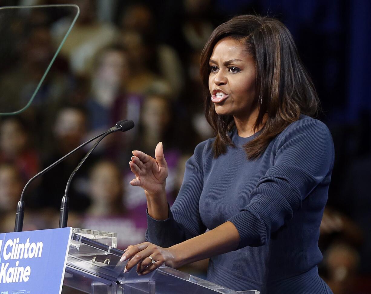 First lady Michelle Obama speaks during a campaign rally for Democratic presidential candidate Hillary Clinton Thursday, Oct. 13, 2016, in Manchester, N.H.