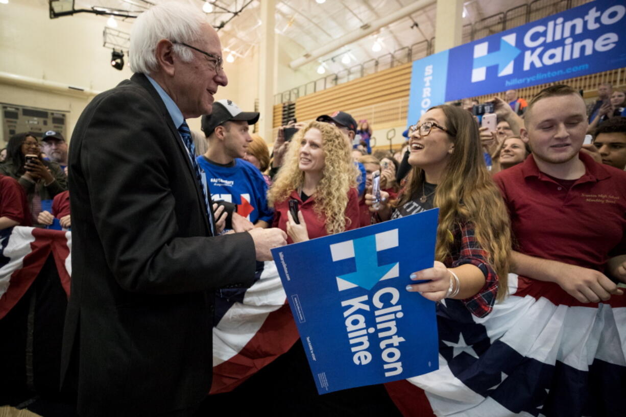 Scarlett Spager, 16, of Old Forge, Pa., smiles as she meets Sen. Bernie Sanders, I-VT, following a rally in support of Hillary Clinton and U.S. Senate candidate Katie McGinty at Scranton High School in Scranton, Pa. on Saturday.