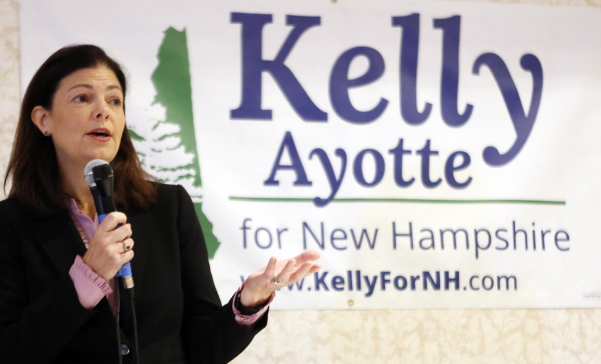 Incumbent candidate for U.S. Senate Republican Kelly Ayotte speaks during a debate with Democratic challenger Gov. Maggie Hassan on Friday in Conway, N.H.