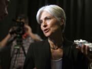 Green party presidential candidate Jill Stein answers questions from members of the media during a campaign stop at Humanist Hall in Oakland, Calif. on Thursday, Oct. 6, 2016. (AP Photo/D.