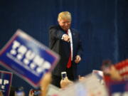 Republican presidential candidate Donald Trump gestures to supporters before speaking at a campaign rally at the University of Northern Colorado, in Greeley, Colo., on Sunday.