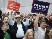 People cheer Saturday during a rally with Republican presidential candidate Donald Trump in Manheim, Pa.