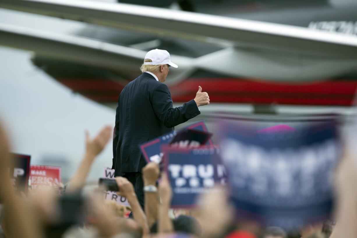 Republican presidential candidate Donald Trump walks to his plane after speaking during a campaign rally, Wednesday, Oct. 12, 2016, in Lakeland, Fla.