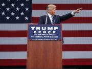 Republican presidential candidate Donald Trump speaks during a campaign rally, Friday, Oct. 14, 2016, in Greensboro, N.C.