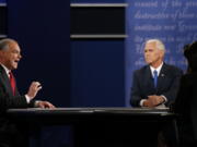 Republican vice presidential nominee Gov. Mike Pence, second from left, and Democratic vice presidential nominee Sen. Tim Kaine debate Tuesday during the vice presidential debate at Longwood University in Farmville, Va.