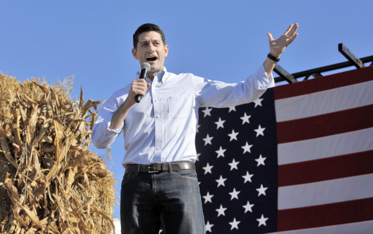 House Speaker Paul Ryan greets the crowd as he takes the stage the 1st Congressional District Republican Party of Wisconsin&#039;s annual Fall Fest event held in Elkhorn, Wis., on Saturday.