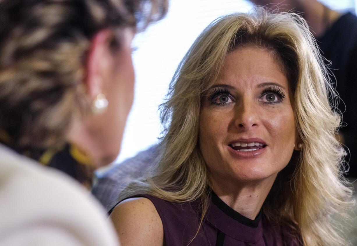 Summer Zervos, right, speaks alongside her attorney Gloria Allred during a news conference in Los Angeles, Friday, Oct. 14, 2016. Zervos, a former contestant on "The Apprentice" says Republican presidential candidate Donald Trump made unwanted sexual contact with her at a Beverly Hills hotel in 2007. Zervos is among several women who have made sexual allegations against the Republican nominee. He has strenuously denied them. (AP Photo/Ringo H.W.