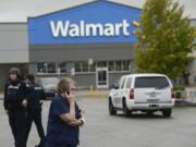 Police investigate a shooting at the Hazel Dell Wal-Mart on Wednesday.