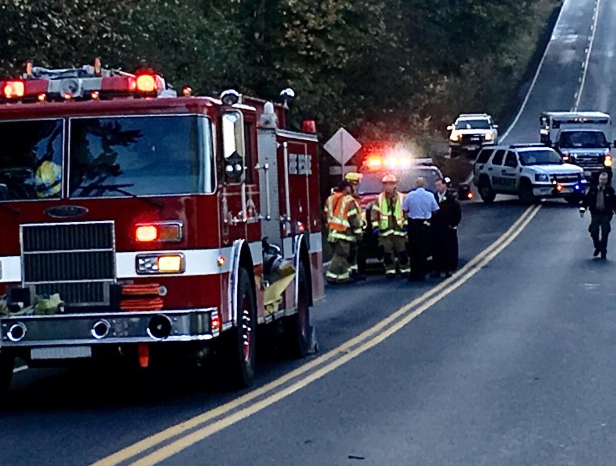 Emergency personnel are at the scene of an accident involving a minivan and a pedestrian at Southeast 82nd Avenue and NE 289th Street north of Battle Ground.