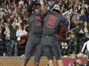 Washington State wide receiver Gabe Marks (9) and wide receiver Tavares Martin Jr. (8) celebrate a touchdown scored by Marks during the first quarter of the Cougars&#039; 51-33 win over Oregon on Saturday night in Pullman.