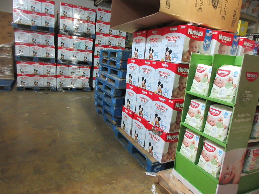 Boxes of donated diapers stacked in a warehouse in North Haven, Conn. The National Diaper Bank Network, which operates the warehouse, distributes the diapers to agencies and community-based organizations like churches, which in turn provide them to families in need. (AP Photo/Beth J.