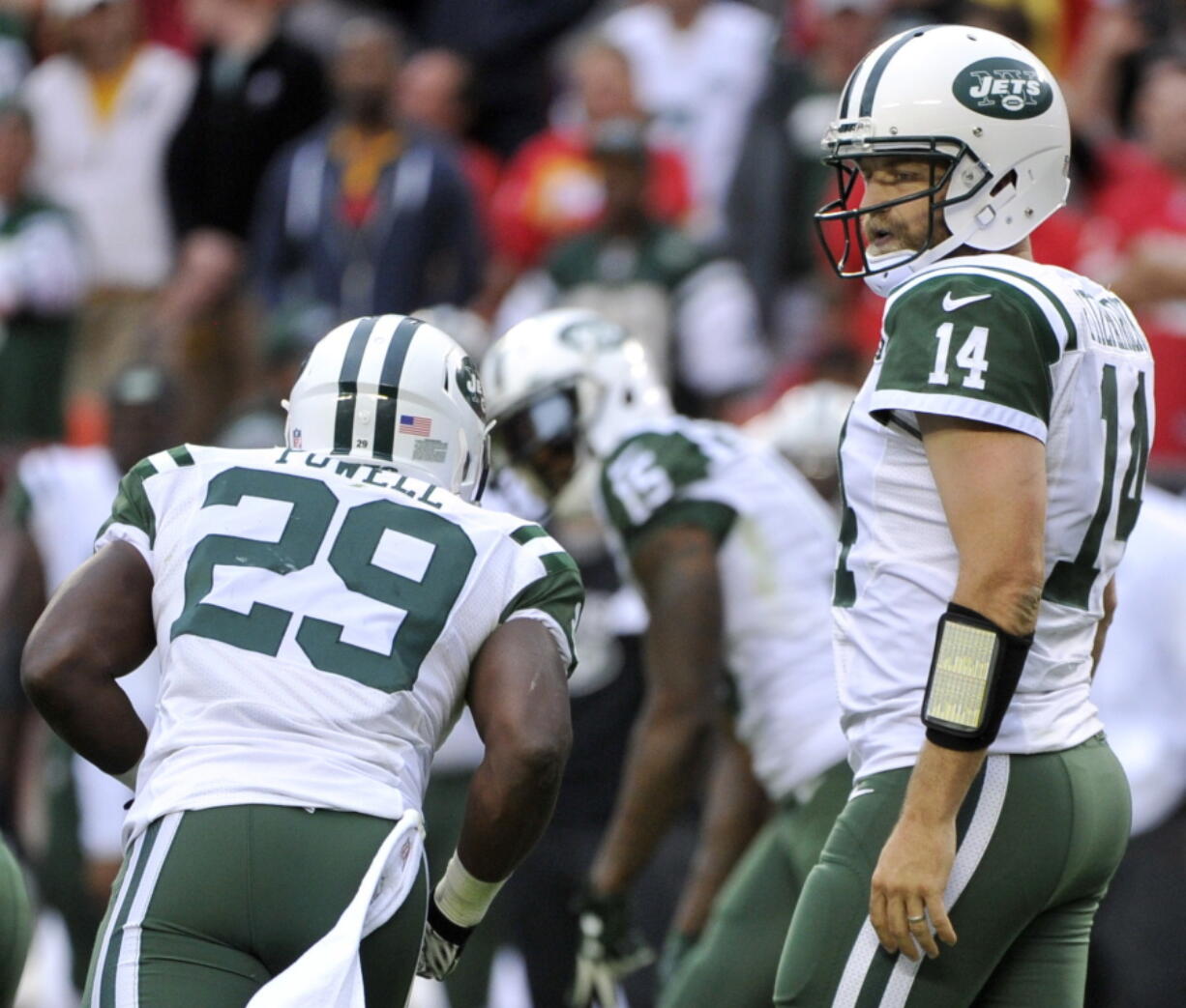 New York Jets quarterback Ryan Fitzpatrick (14) walks to the line of scrimmage during the second half of an NFL football game against the Kansas City Chiefs in Kansas City, Mo. Carroll and the Seattle Seahawks watched the Jets' ugly game film from last week, when Ryan Fitzpatrick kept throwing the ball to the other team. One interception after the other _ six in all for the New York quarterback. Carroll's not expecting anything close to that type of slopfest on Sunday when the Seahawks (2-1) take on the Jets (1-2).