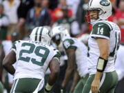 New York Jets quarterback Ryan Fitzpatrick (14) walks to the line of scrimmage during the second half of an NFL football game against the Kansas City Chiefs in Kansas City, Mo. Carroll and the Seattle Seahawks watched the Jets' ugly game film from last week, when Ryan Fitzpatrick kept throwing the ball to the other team. One interception after the other _ six in all for the New York quarterback. Carroll's not expecting anything close to that type of slopfest on Sunday when the Seahawks (2-1) take on the Jets (1-2).