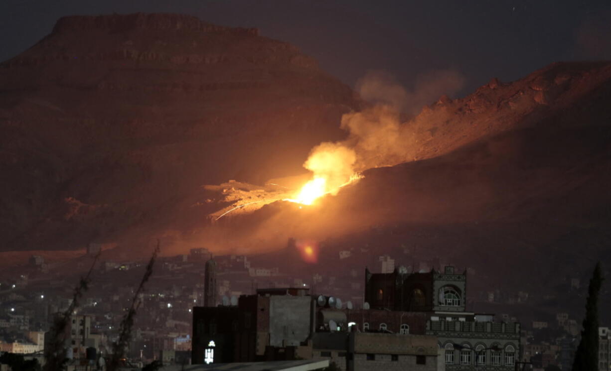 Fire and smoke rise Friday after a Saudi-led airstrike hit a site believed to be one of the largest weapons depots on the outskirts of Yemen&#039;s capital, Sanaa.