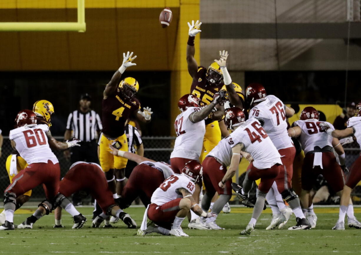 Seton Catholic graduate Erik Powell (46) kicks a field goal for Washington State against Arizona State.