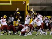 Seton Catholic graduate Erik Powell (46) kicks a field goal for Washington State against Arizona State.