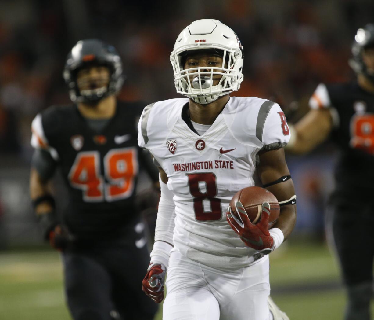 Washington State receiver Tavares Martin Jr. (8) beats the Oregon State defense to the end zone for a touchdown during the first half of an NCAA college football game in Corvallis, Ore., Saturday, Oct. 29, 2016. (AP Photo/Timothy J.