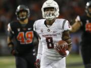 Washington State receiver Tavares Martin Jr. (8) beats the Oregon State defense to the end zone for a touchdown during the first half of an NCAA college football game in Corvallis, Ore., Saturday, Oct. 29, 2016. (AP Photo/Timothy J.