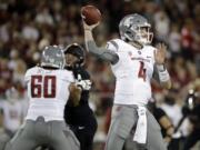 Washington State quarterback Luke Falk (4) throws against Stanford during the first half of an NCAA college football game Saturday, Oct. 8, 2016, in Stanford, Calif.