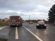 A woman was injured when a Vancouver fire engine crashed into a minivan in east Vancouver this morning.