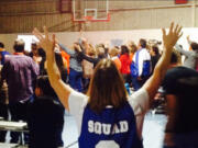 A church volunteer during a new Friday night service at Valley Dream Center, led by Coach Dave Standley.