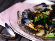 If you are concerned about any amount of contaminants, registered dietitian Kate Geagan suggests buying smaller-size seafood, such as sardines, mussels and clams. (Dixie D.