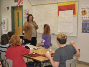 Washougal: Canyon Creek Middle School and Jemtegaard Middle School students work with Bobby Walker, tobacco prevention coordinator from Educational Service District 112, on a video showing the dangers of vaping.