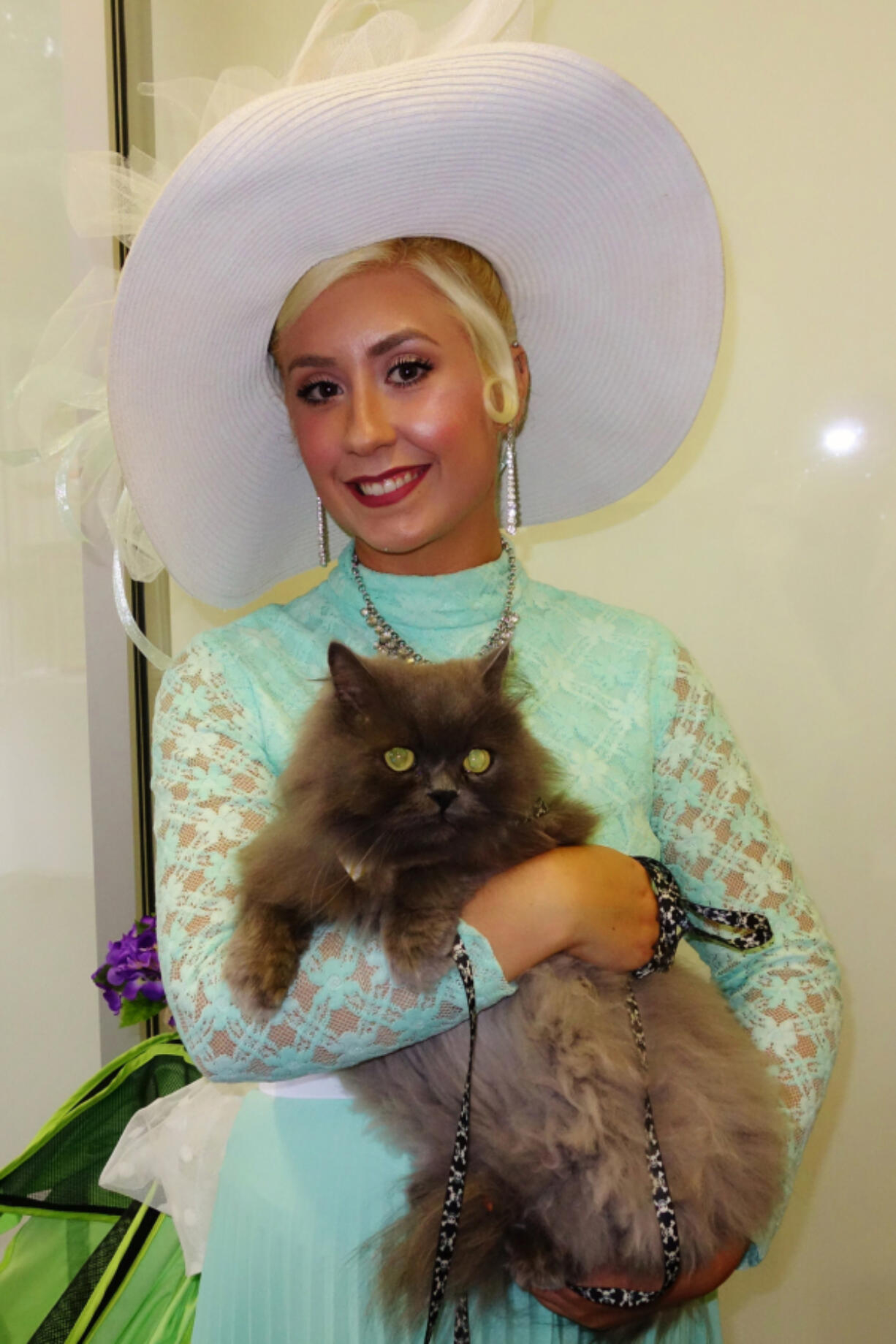 Walnut Grove: Tess Ewart and her cat, Griff, won the costume contest at Furry Friends&#039; My Fair Kitty fundraiser, which brought in $32,500 for the nonprofit cat shelter.