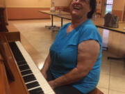 Salmon Creek: Eileen Kammer, a patient at ManorCare Services, using a new piano donated to the center through the School of Piano Technology for the Blind?s Piano Adoption Program.