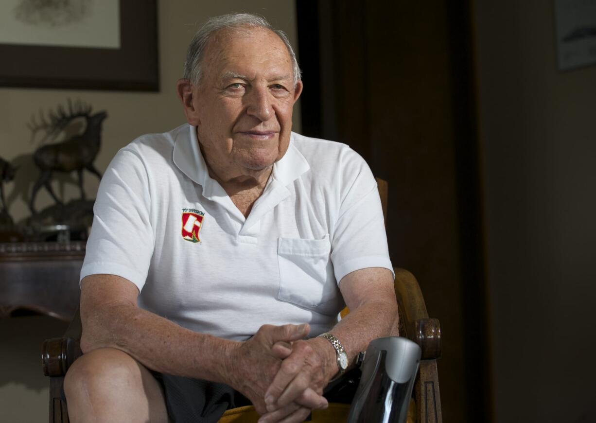 Dale Bowlin poses for a portrait at his Fisher's Landing home in September 2014. There will be a service for Bowlin, who died Nov. 13, at 3 p.m. today at First United Methodist Church in Vancouver.