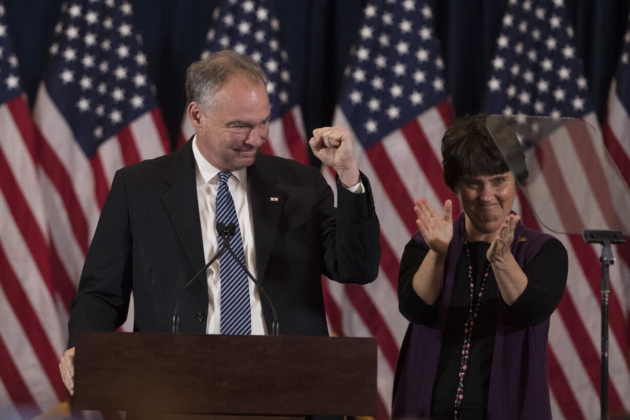 Democratic vice presidential candidate, Sen. Tim Kaine, D-Va., accompanied by his wife Anne Holton speaks in New York on Nov. 9.